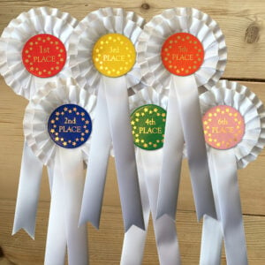 1st to 6th Place white rosettes with award coloured centre